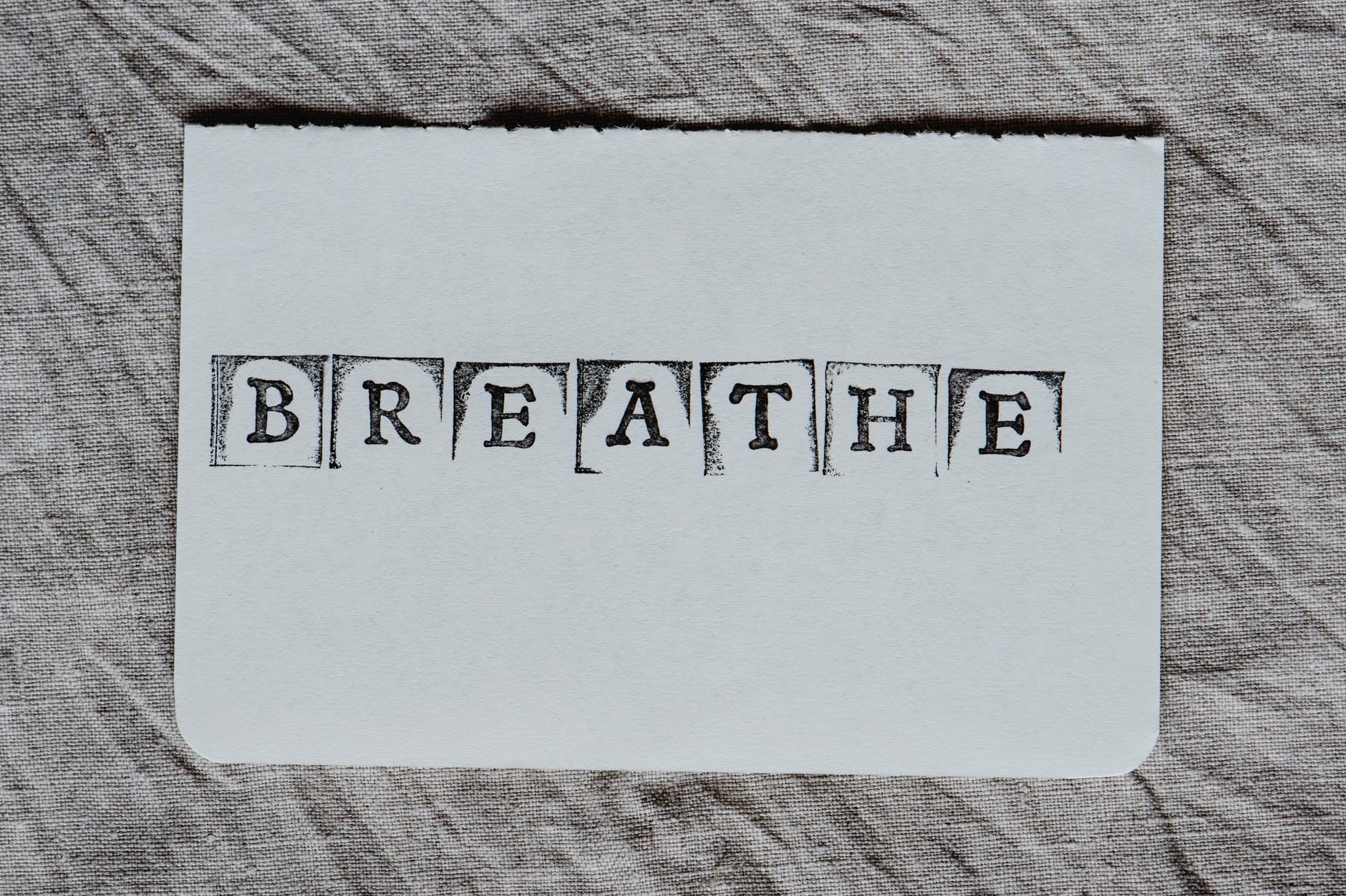 breath word on a white card